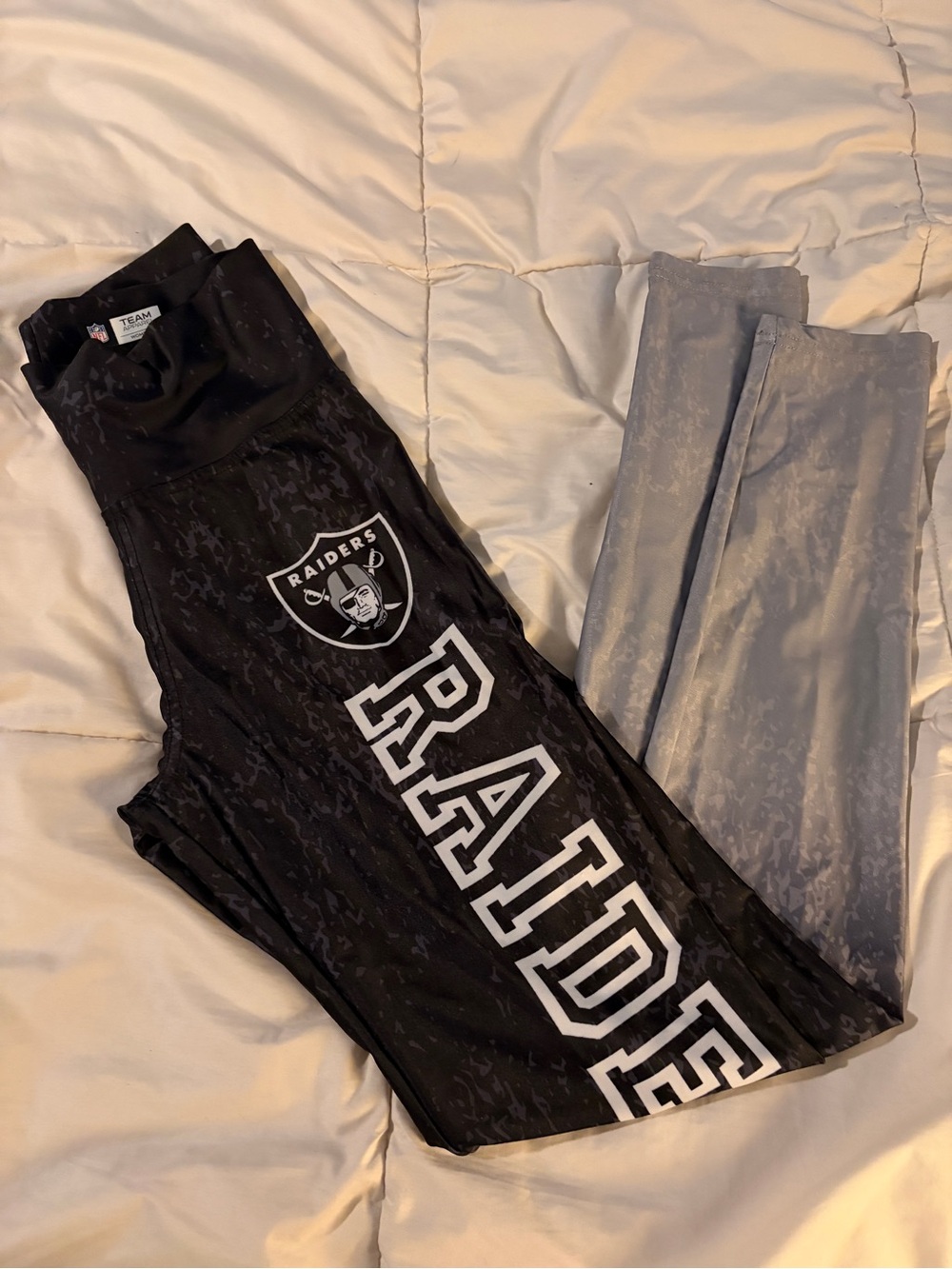 Las Vegas Raiders NFL Zubaz leggings.